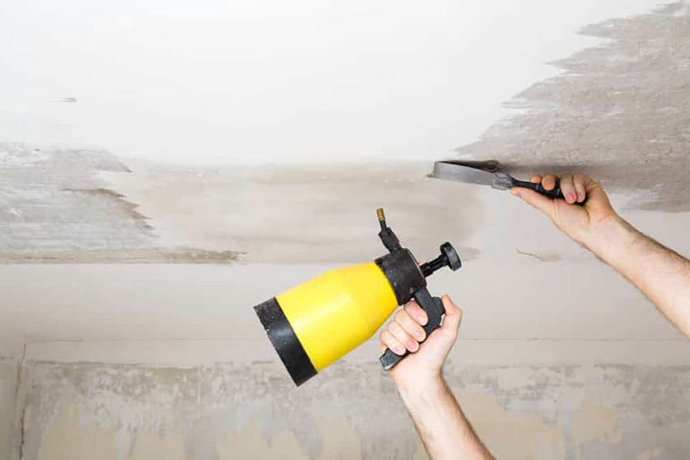 How to fix a cracked popcorn ceiling - Spray popcorn treatment