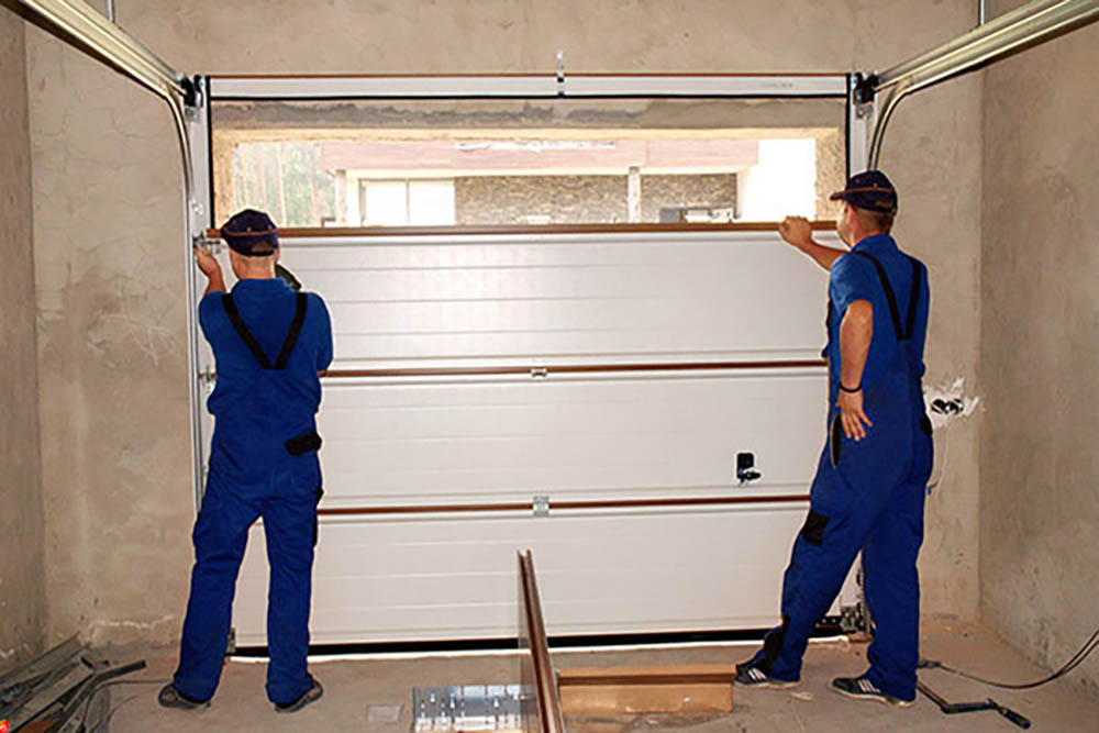 How To Fix A Garage Door That Rolled Off Track